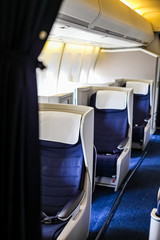 Obraz premium Interior view of Empty Airplane seats on board a jet liner