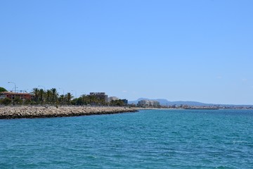 Fototapeta premium The Bay of Palma and Palma de Mallorca embankment seen from the harbour. Palma de Mallorca, Mallorca / Majorca, Spain