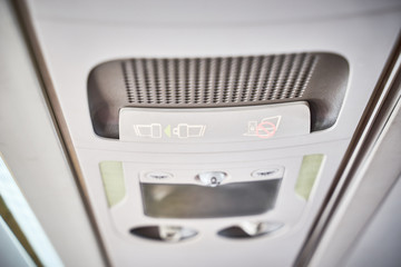 No Smoking, No electronic devices, put on seat belt, reading lamps, air condition, air vent, speaker etc. on a plane