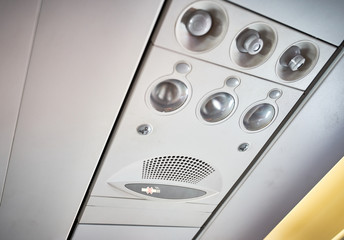 No Smoking, No electronic devices, put on seat belt, reading lamps, air condition, air vent, speaker etc. on a plane