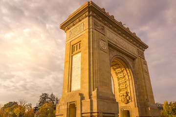 The Triumphal Arch (Arcul de Triumf) in Bucharest, Romania - obrazy, fototapety, plakaty