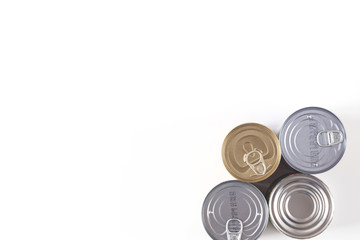 Tin, canned food isolated on white. Stock and proviant concept. Long-term storage products.
