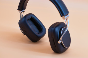 Obraz na płótnie Canvas Black headphone high quality sound. close up background