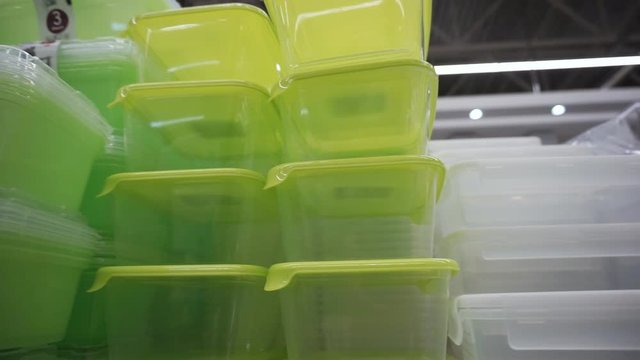 Plastic Food Containers On Supermarket Shelves.