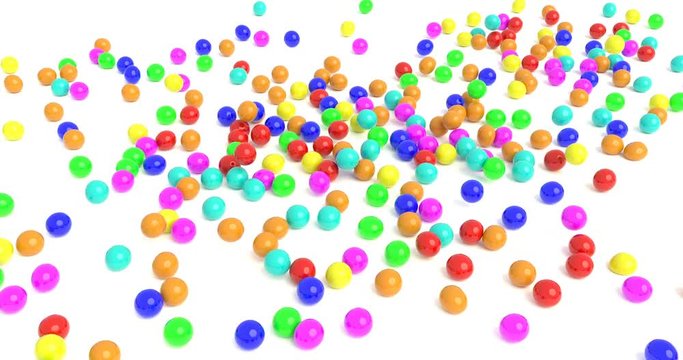 Colored rubber balls fall on a white surface 4k