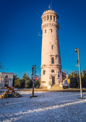 Lookout tower on the peak of Wielka Sowa Mountain in Owl Mountains Landscape Park, Poland © Fotokon