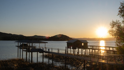 pier at Clare lake at sunset, california