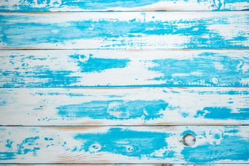 Fototapeta na wymiar Textured blue summer wooden background. Top view.