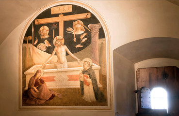 Jesus Christ coming from tomb, 15th century fresco by Fra Angelico inside a monastery cell, in Convent of San Marco. Florence.