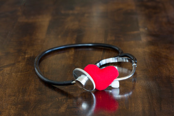 Stethoscope and red heart love shape