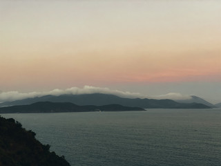 Sunset on the sea with a panoramic view from the top of the cliff
