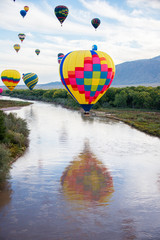 Fototapeta premium Hot Air Balloon Reflected in the Rio Grande
