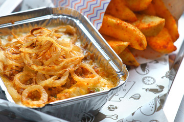 baked cod in cream with onion fries and fried potatoes
