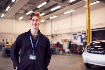 Portrait Of Male Student Studying For Auto Mechanic Apprenticeship At College
