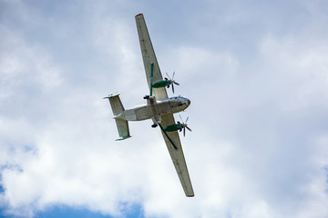 old transport plane flies at an air show