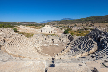 Fototapeta na wymiar Theater in the ancient city of Patara, Antalya, Turkey.