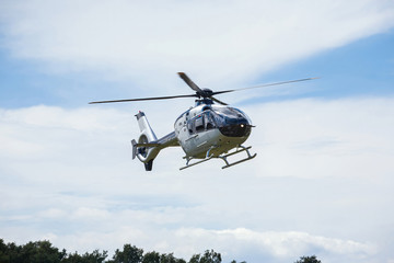 passenger helicopter flies at an air show
