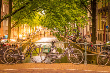 Fototapeta na wymiar Amsterdam canal and bikes, The Netherlands