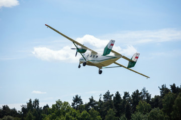old transport plane flies at an air show