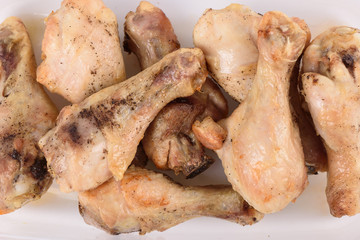 Grilled chicken drumsticks with pepper. Diet food.