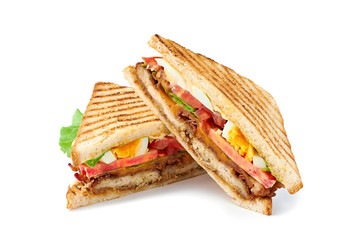 Two halves of juicy club sandwich on white