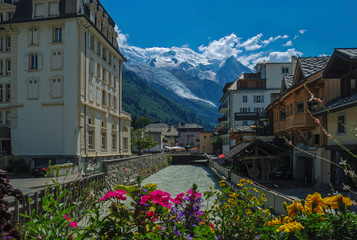 Fototapeta na wymiar View of the Mer de Glacier Glacier and the snowy summit of Mont Blanc from the flower town of Chamonix