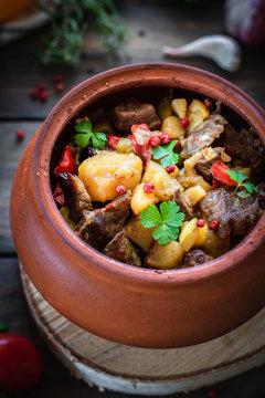 Roast in a clay pot. Braised beef with vegetables. A dish of Georgian cuisine. Chanahi