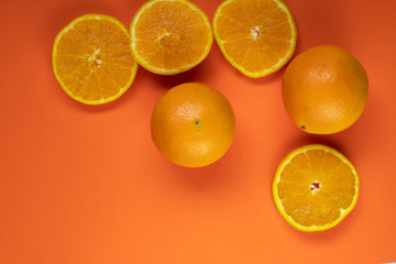 Creative summer pattern made of oranges and on pastel orange background. Fruit minimal concept.Flat floor.