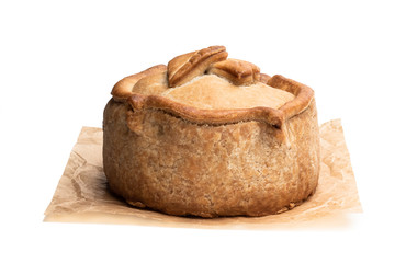 Seasoned cured pork and ham pie isolated on white
