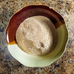 breadcrumbs in bowl on kitchen table