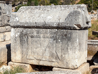 Fototapeta premium Sarcophagus ruins in the necropolis of Patara ancient city, Antalya, Turkey.