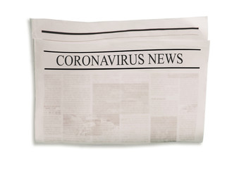 Coronavirus Covid-19 news. Newspapers with headlines on horizontal surface.