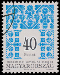Stamp printed in Hungary shows Folk Art motives