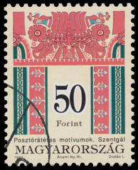 Stamp printed in Hungary shows Folk Art motives