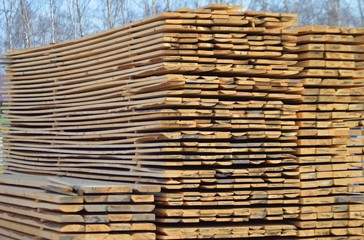 
a pack of building boards lies on the street