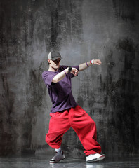 Obraz na płótnie Canvas young modern hip hop male dancer