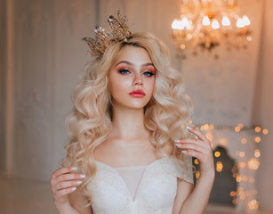 Closeup portrait elegant woman fantasy princess. Blonde girl long wavy hair. Beautiful face gentle...