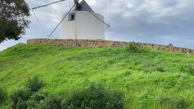 A traditional Portuguese windmill near the Algarve town of Odeceixe, Portugal. 