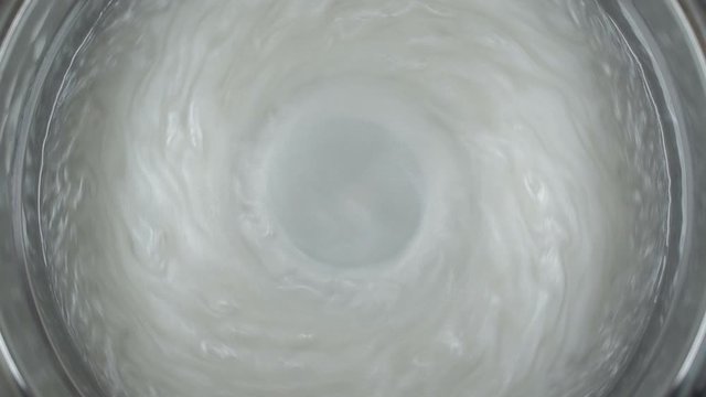 Rheoscopic fluid. Beautiful movement of particles in a liquid. Fantastic patterns and shapes. 50 fps