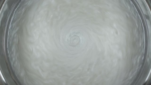 Rheoscopic fluid. Beautiful movement of particles in a liquid. Fantastic patterns and shapes. 50 fps