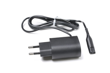 Charger, power supply for portable electronics. Isolated on a white background with a shadow.