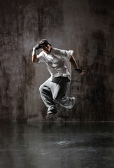 Naklejka na ściany i meble young modern hip hop male dancer