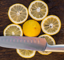 Lemon slices and knife