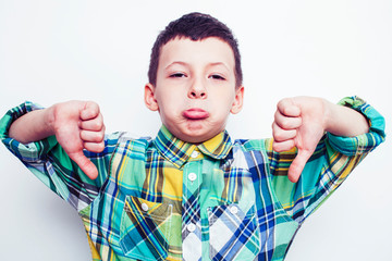 little cute real boy on white background gesture smiling close up, lifestyle people concept