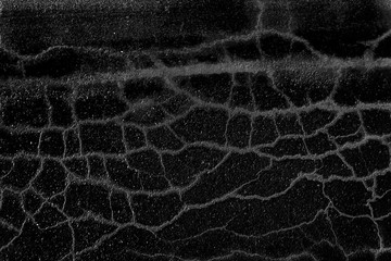 asphalt in cracks texture / abstract background cracks on asphalt road