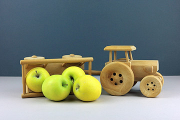 Apple's from a tipped over toy wooden cart.