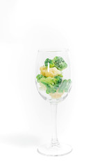 broccoli in a glass with onions