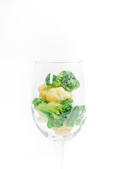 broccoli in a glass with onions