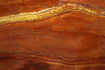 Background of natural stone in lush lava called Travertin Rosso