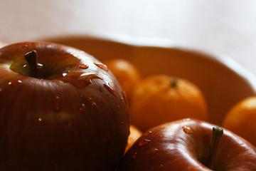 
apple close up with a drop of water